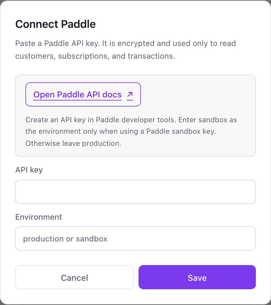 The Connect Paddle pop-up with an Open Paddle API docs link and fields for API key and Environment